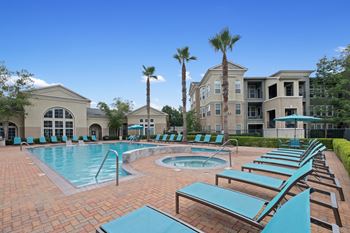 Our apartments offer a large swimming pool with lounge chairs